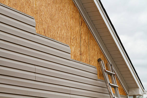 Professional Siding Repair technician working in Merrick, NY